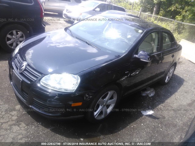 3VWRA7AJ6AM058999 - 2010 VOLKSWAGEN JETTA WOLFSBURG BLACK photo 2