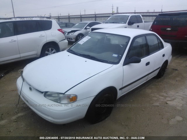 1Y1SK5286XZ424920 - 1999 CHEVROLET GEO PRIZM LSI WHITE photo 2