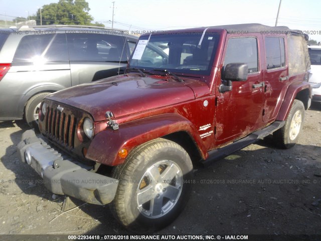 1J4GA59139L759283 - 2009 JEEP WRANGLER UNLIMITE SAHARA MAROON photo 2