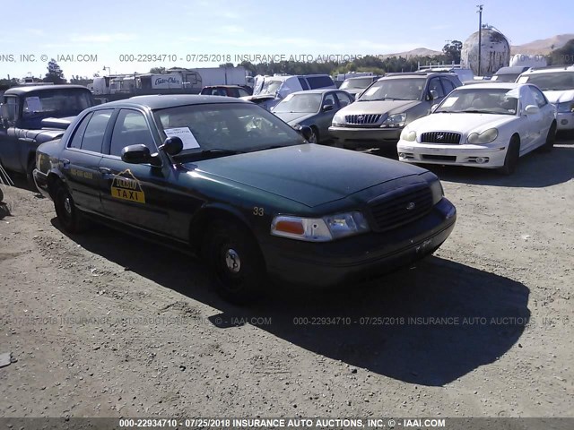 2FAFP71W0YX170167 - 2000 FORD CROWN VICTORIA POLICE INTERCEPTOR GREEN photo 1