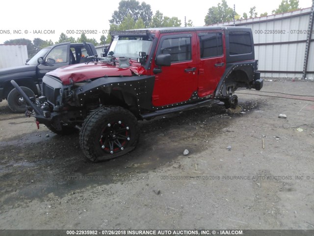 1C4BJWDG1EL232421 - 2014 JEEP WRANGLER UNLIMITE SPORT RED photo 2