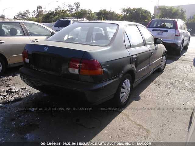 JHMEJ6679VS028481 - 1997 HONDA CIVIC LX GREEN photo 4