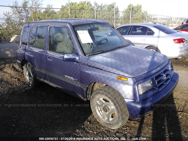 2CNBE1365T6919662 - 1996 GEO TRACKER BLUE photo 1