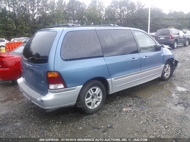 2FMDA53483BA16780 - 2003 FORD WINDSTAR SEL BLUE photo 4