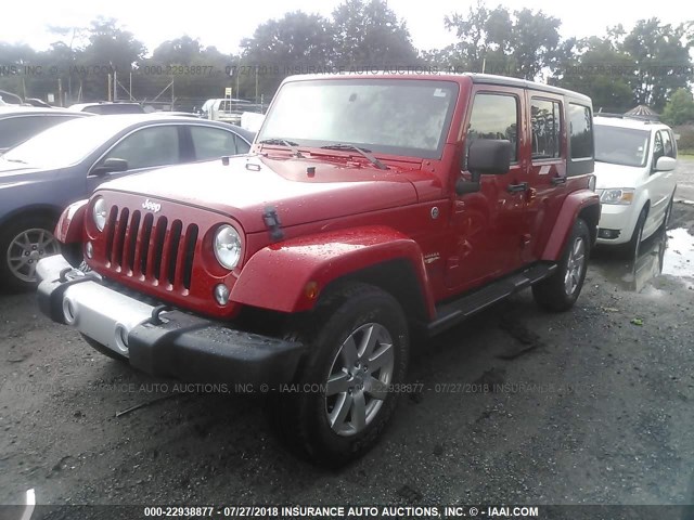 1C4BJWEGXEL128945 - 2014 JEEP WRANGLER UNLIMITE SAHARA RED photo 2