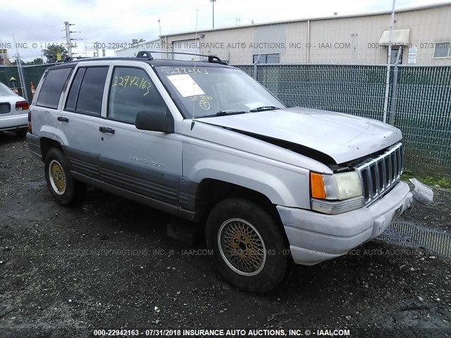 1J4GZ58S0VC630009 - 1997 JEEP GRAND CHEROKEE LAREDO/TSI GRAY photo 1