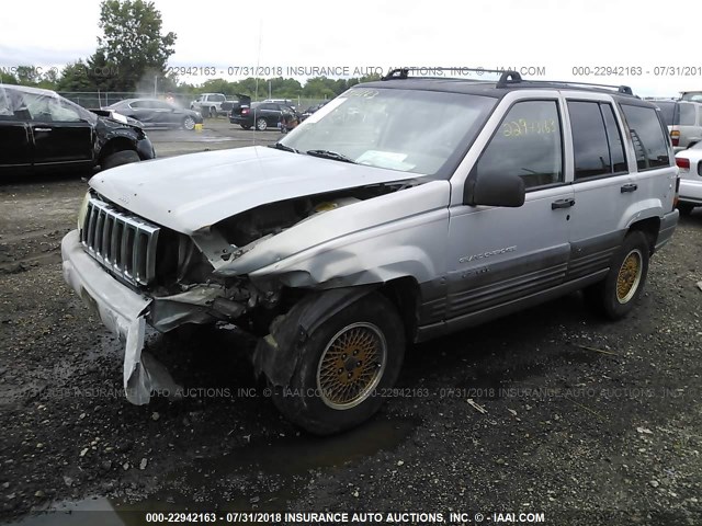 1J4GZ58S0VC630009 - 1997 JEEP GRAND CHEROKEE LAREDO/TSI GRAY photo 2