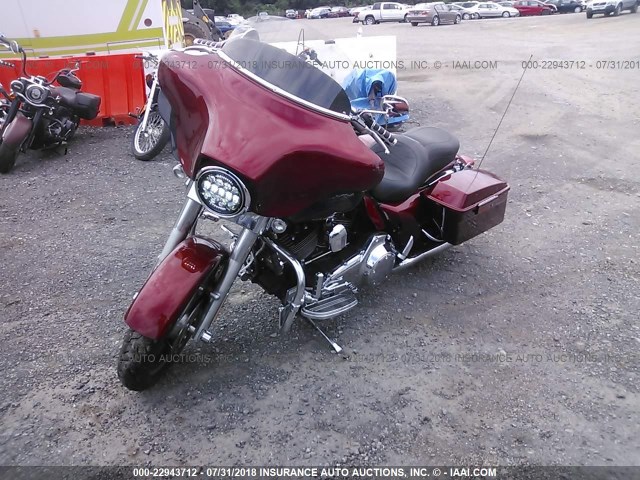 1HD1KB4129Y607088 - 2009 HARLEY-DAVIDSON FLHX RED photo 2