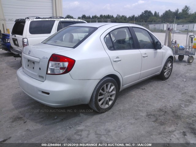 JS2YC5A27B6303712 - 2011 SUZUKI SX4 LE WHITE photo 4