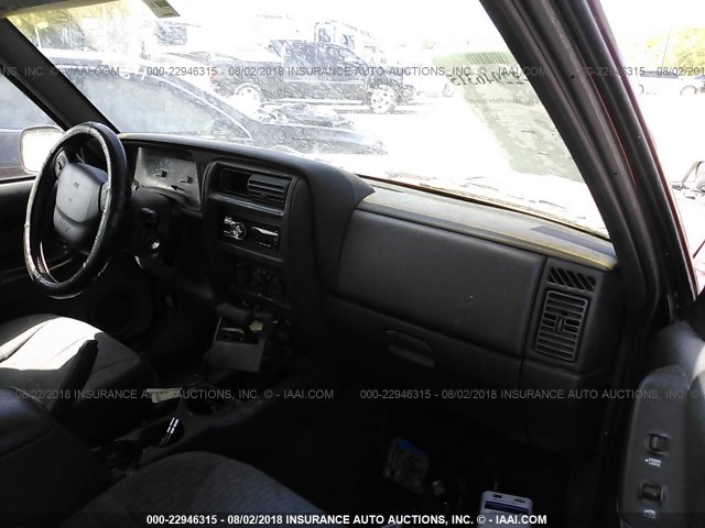 1J4FF68SXXL573718 - 1999 JEEP CHEROKEE SPORT/CLASSIC ნარინჯისფერი ფოტო 5