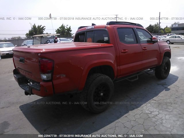3TMCZ5AN7GM023647 - 2016 TOYOTA TACOMA DBL CAB/SR/SR5/TRD SPT/OR ORANGE photo 4