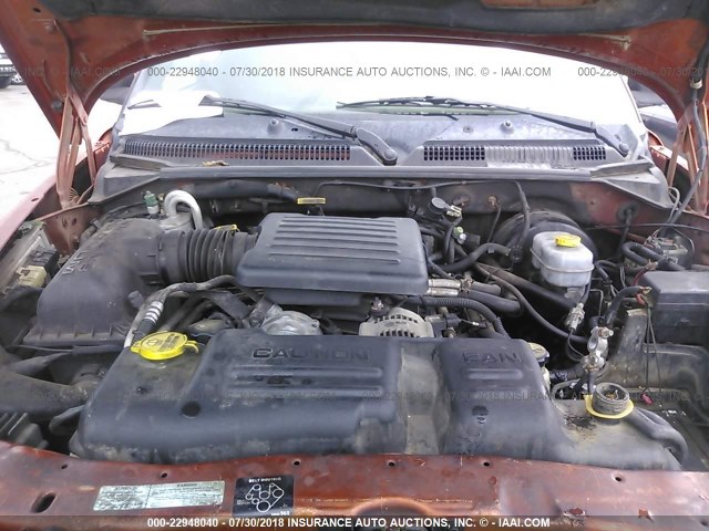 1B7GG2AN1YS619285 - 2000 DODGE DAKOTA QUAD ORANGE photo 10