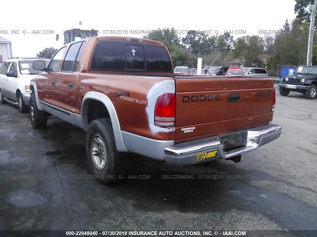 1B7GG2AN1YS619285 - 2000 DODGE DAKOTA QUAD ORANGE photo 3