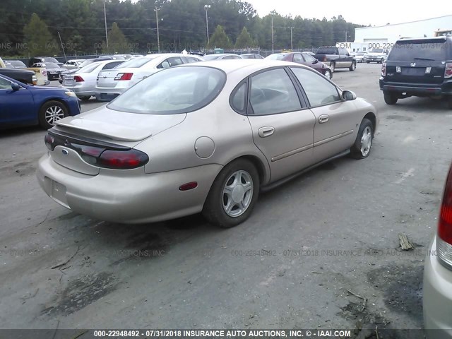 1FAFP53S3XA188460 - 1999 FORD TAURUS SE/COMFORT/SPORT BEIGE photo 4