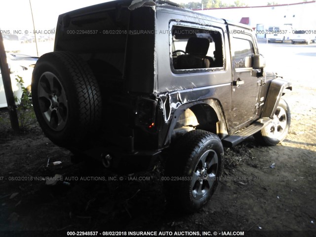 1J4FA54147L160098 - 2007 JEEP WRANGLER SAHARA BLACK photo 4