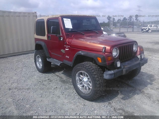 1J4FY19S1WP755262 - 1998 JEEP WRANGLER / TJ SPORT MAROON photo 1