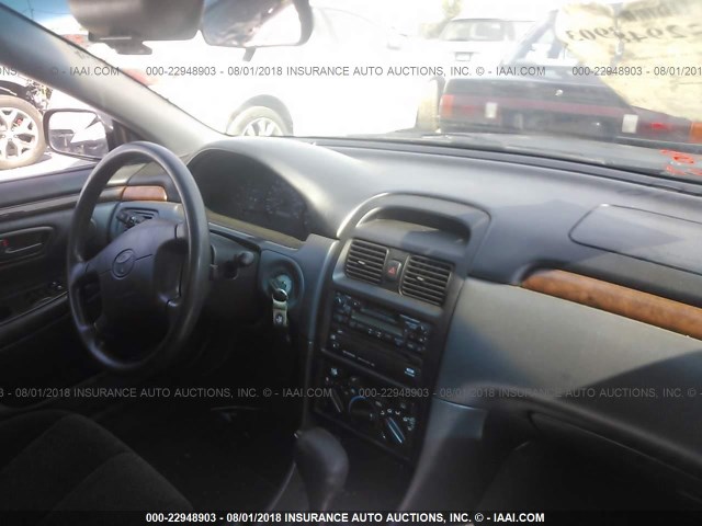 2T1CF22P0XC183966 - 1999 TOYOTA CAMRY SOLARA SE/SLE შავი ფოტო 5