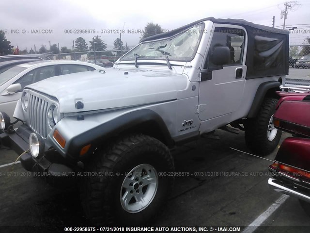 1J4FA49S94P787718 - 2004 JEEP WRANGLER / TJ SPORT SILVER photo 2