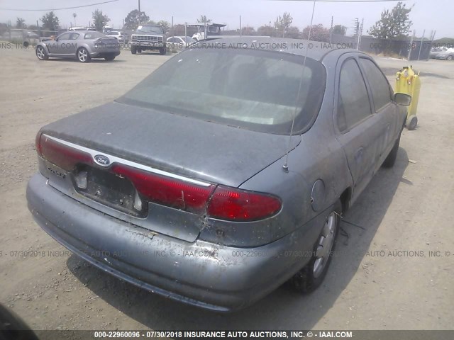 1FAFP6632XK190429 - 1999 FORD CONTOUR SE Light Blue photo 4