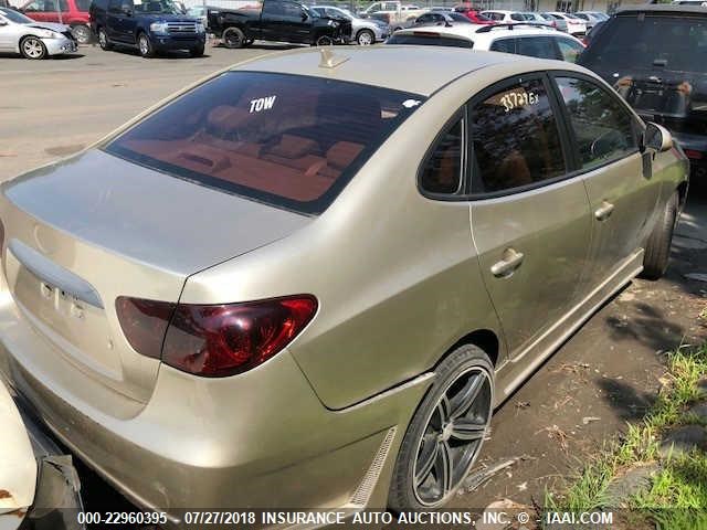 KMHDU4AD2AU946640 - 2010 HYUNDAI ELANTRA BLUE/GLS/SE GOLD photo 4