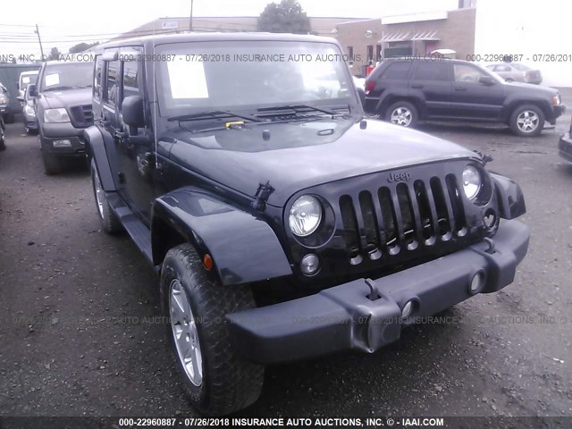 1J4BA5H17AL194066 - 2010 JEEP WRANGLER UNLIMITE SAHARA BLACK photo 1