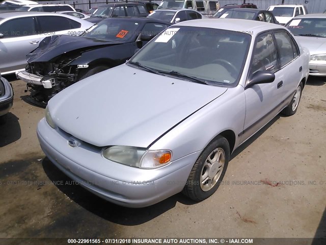 1Y1SK52862Z415613 - 2002 CHEVROLET GEO PRIZM LSI SILVER photo 2
