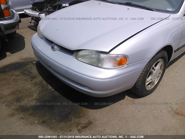 1Y1SK52862Z415613 - 2002 CHEVROLET GEO PRIZM LSI SILVER photo 6