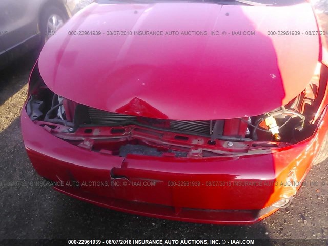 1FAHP35N98W272940 - 2008 FORD FOCUS SE/SEL/SES RED photo 6