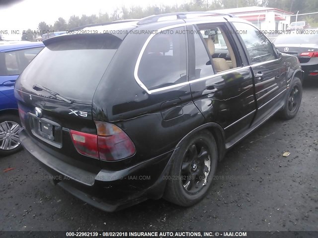 5UXFB33562LH32066 - 2002 BMW X5 4.4I BLACK photo 4
