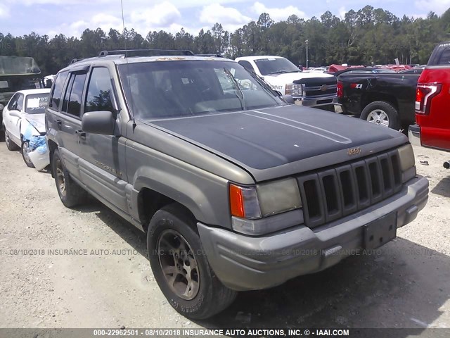 1J4GZ78Y1VC507495 - 1997 JEEP GRAND CHEROKEE LIMITED/ORVIS GOLD photo 1