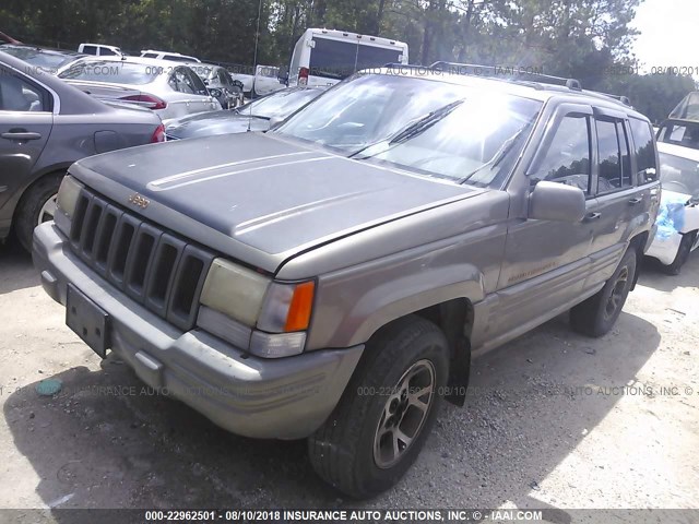 1J4GZ78Y1VC507495 - 1997 JEEP GRAND CHEROKEE LIMITED/ORVIS GOLD photo 2