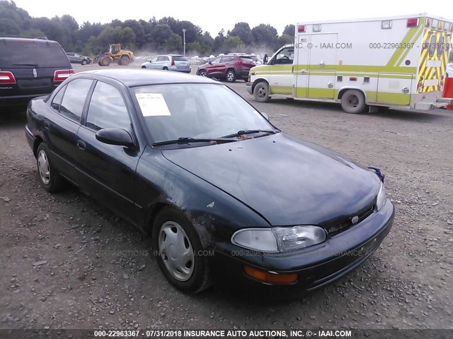 1Y1SK5282VZ420473 - 1997 GEO PRIZM LSI GREEN photo 1