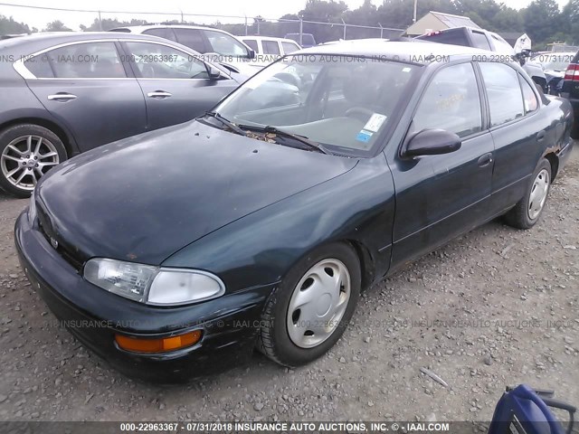 1Y1SK5282VZ420473 - 1997 GEO PRIZM LSI GREEN photo 2