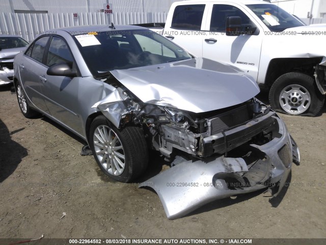 1G2ZG57B294126975 - 2009 PONTIAC G6 SILVER photo 1