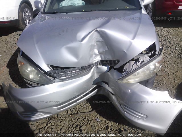 4T1BE32KX2U056223 - 2002 TOYOTA CAMRY LE/XLE/SE 银色 照片 6