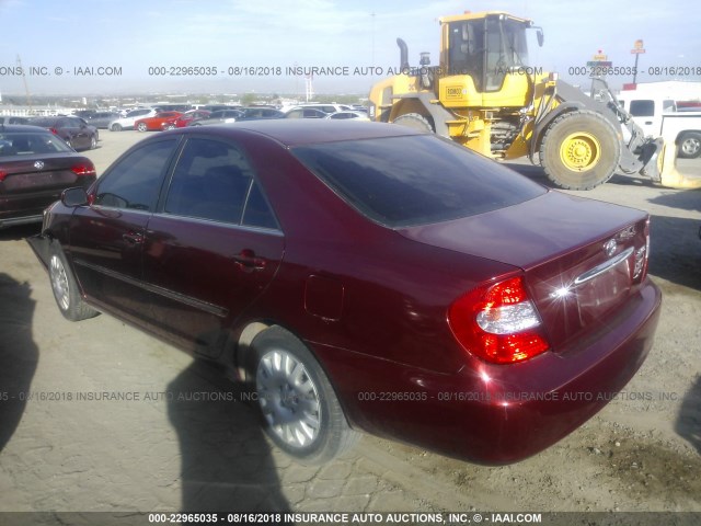 JTDBE32KX20051793 - 2002 TOYOTA CAMRY LE/XLE/SE Qırmızı foto 3