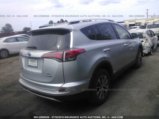 JTMRJREV7GD001453 - 2016 TOYOTA RAV4 HV XLE SILVER photo 4