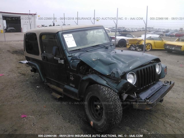 1J4FY49SXXP460065 - 1999 JEEP WRANGLER / TJ SAHARA GREEN photo 1