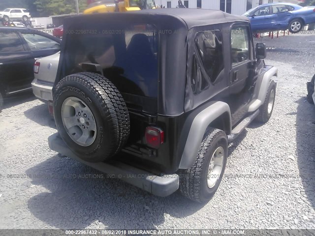 1J4FA49S92P771533 - 2002 JEEP WRANGLER / TJ SPORT BLACK photo 4