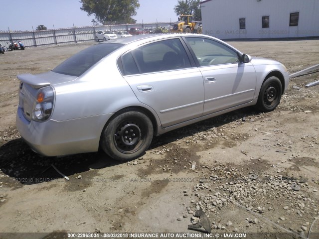 1N4AL11EX2C174404 - 2002 NISSAN ALTIMA S/SL SILVER photo 4