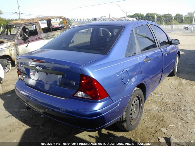 1FAHP34314W178464 - 2004 FORD FOCUS SE COMFORT/SE SPORT BLUE photo 4