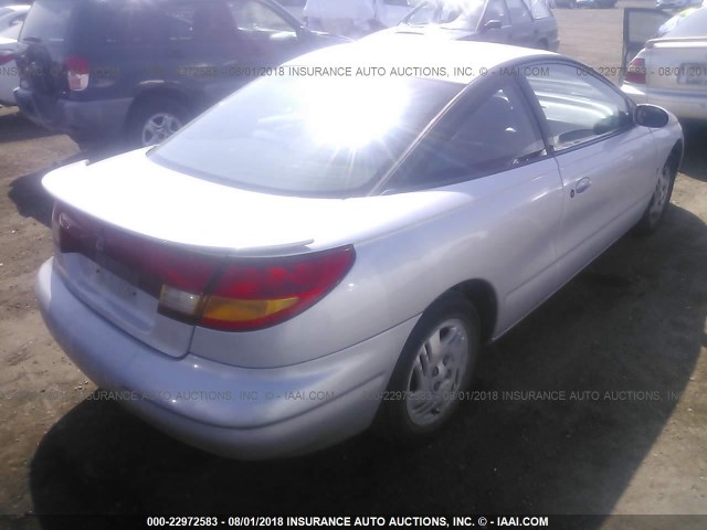 1G8ZR1274XZ352480 - 1999 SATURN SC2 SILVER photo 4