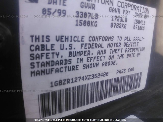 1G8ZR1274XZ352480 - 1999 SATURN SC2 SILVER photo 9