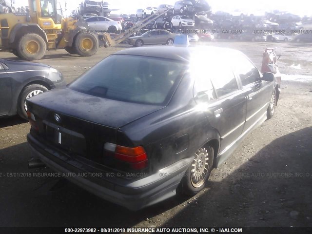 WBACA5310PFG06384 - 1993 BMW 318 I BLACK photo 4