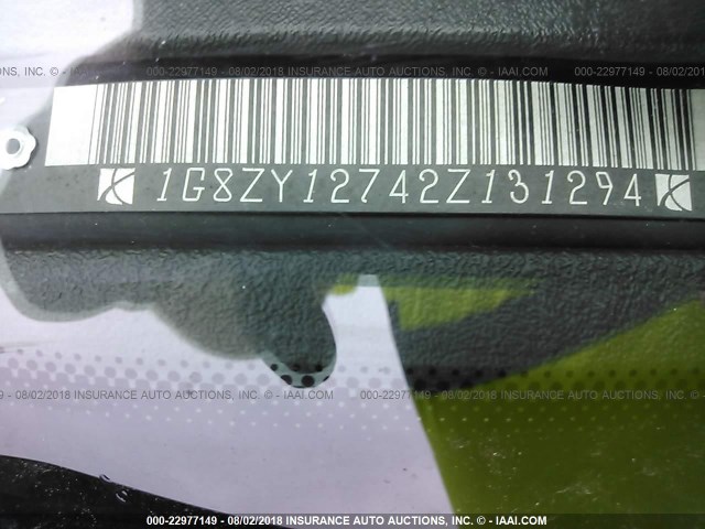 1G8ZY12742Z131294 - 2002 SATURN SC2 SILVER photo 9