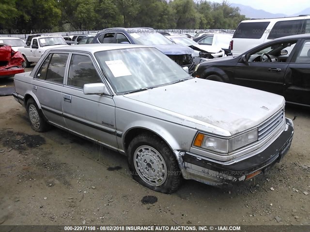 JN1HU11S3GT100523 - 1986 NISSAN MAXIMA SILVER photo 1