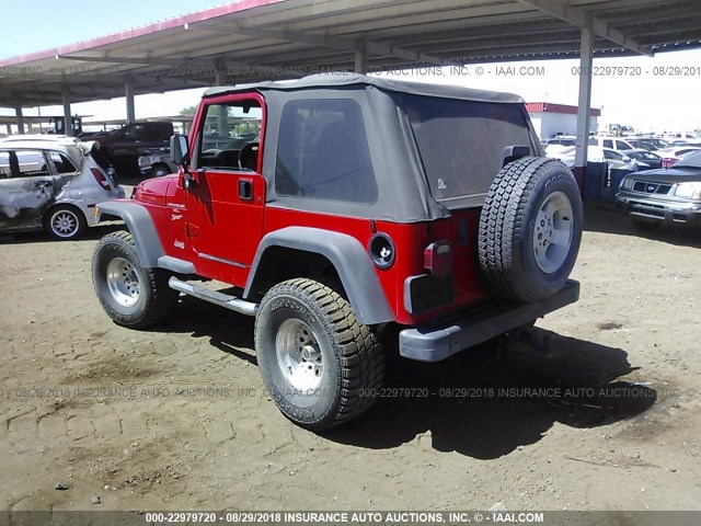 1J4FA49S3YP737774 - 2000 JEEP WRANGLER / TJ SPORT RED photo 3