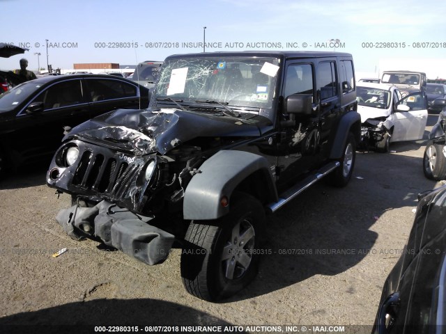 1C4BJWDG8CL269950 - 2012 JEEP WRANGLER UNLIMITE SPORT BLACK photo 2