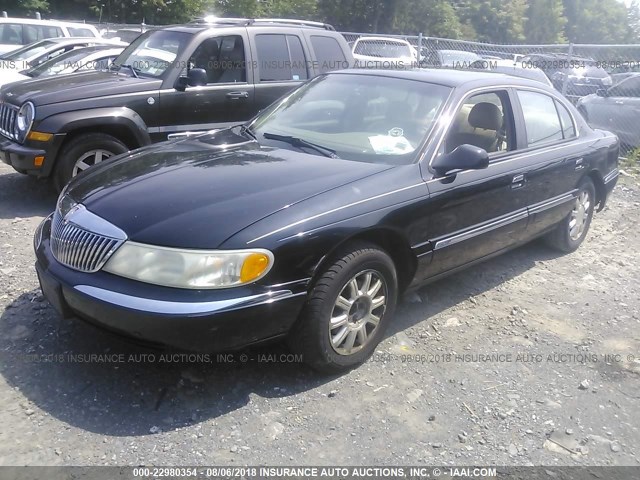 1LNHM97V7XY690060 - 1999 LINCOLN CONTINENTAL  Սև լուսանկար 2