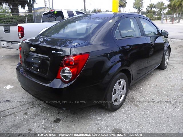 1G1JA5SH3E4227497 - 2014 CHEVROLET SONIC LS BLACK photo 4